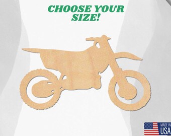 May include: A wooden cutout of a dirt bike, perfect for crafting projects.  Choose your size!  Made in the USA.