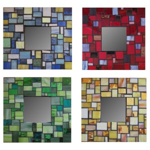 May include: Four square mosaic mirror frames with different colored glass tiles. The frames are blue, red, green, and yellow.