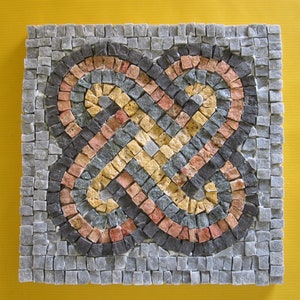 May include: A mosaic tile artwork featuring a geometric pattern of interlocking loops in shades of gray, black, red, yellow, and beige.
