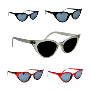 May include: Four pairs of cat-eye sunglasses in different colours. The sunglasses are black, clear, red, and tortoiseshell.