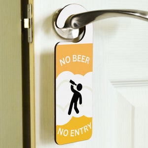 May include: A yellow and white door hanger with the text "NO BEER NO ENTRY" and a silhouette of a person drinking from a bottle.