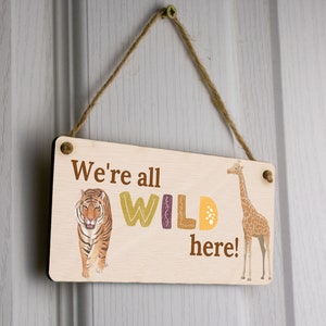 We Are All Wild Here Hanging Plywood Sign - Fun Home Decor Gift with Wild Animal Design: Tiger in the Jungle