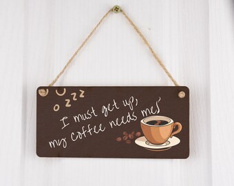 I Must Get Up My Coffee Needs Me - Plywood Hanging Sign - Coffee Themed Home Decor Idea for Family and Friends. (smlsgn-ds23-cofneeds)