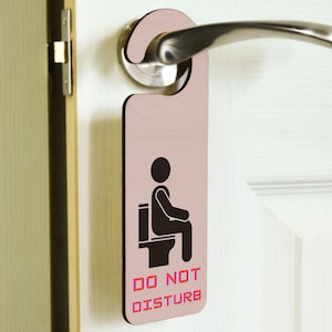 Do Not Disturb - Bathroom Plywood Door Handle Hanger - Novelty Pink Bathroom Door Sign (doorh-ha23-mantoil)