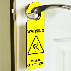 Warning: Entering Creative Zone - Novelty Warning Plywood Door Handle Hanger (doorh-ha23-creativity)
