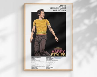 May include: A framed concert poster for Harry Styles at Wembley Stadium in London on June 13th 2026. The illustration features a person in a yellow striped shirt and brown trousers against a black background, with a setlist of song titles below.