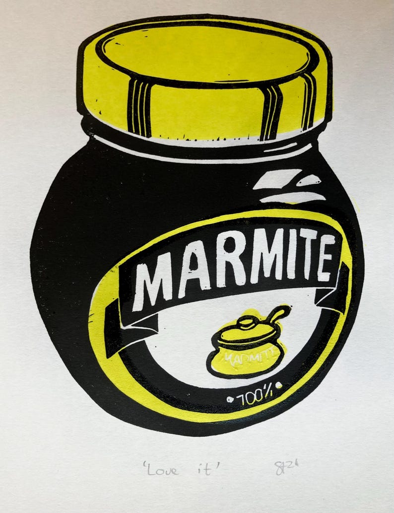 May include: A black and yellow illustration of a jar of Marmite, a popular yeast extract spread. The jar has a yellow lid and the word "Marmite" is printed in white letters on the front. The text "100%" is printed in white letters below a small yellow pot with a handle.
