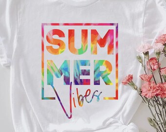 May include: White t-shirt with a tie-dye design that says "SUMMER vibes" in a black box.
