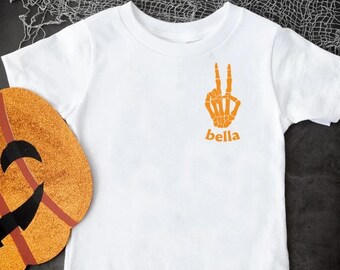 Personalized Halloween Shirt, Custom Name Skeleton Hand Tee, Spooky Fall Graphic, Kids Halloween Outfit