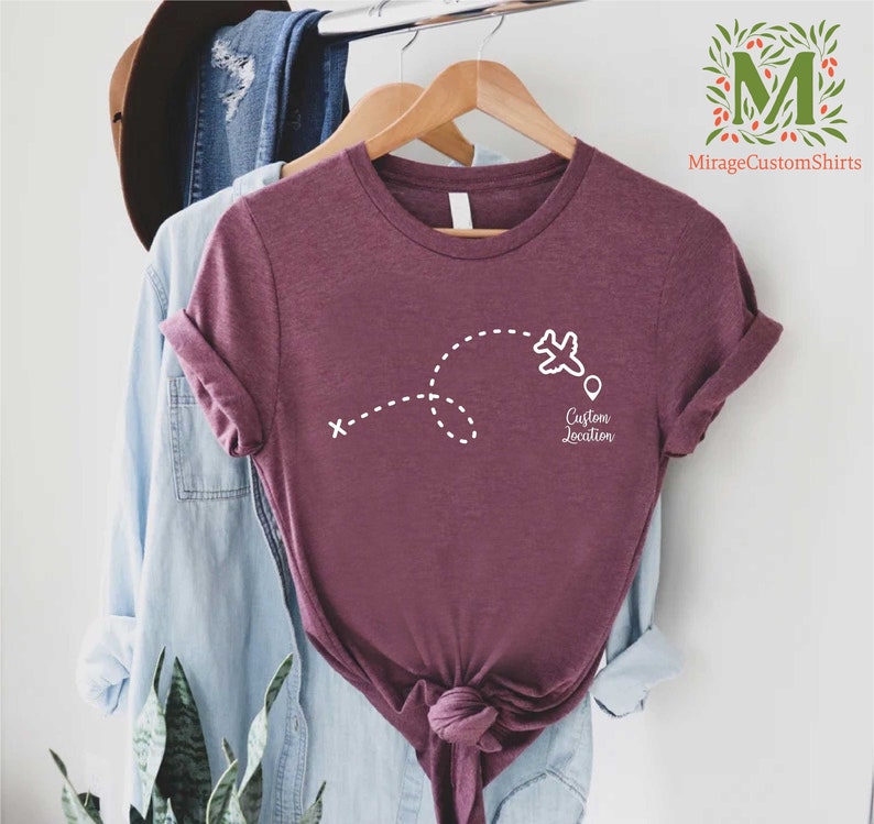 a t - shirt hanging on a clothes rack