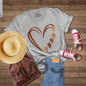 a t - shirt that has a heart on it