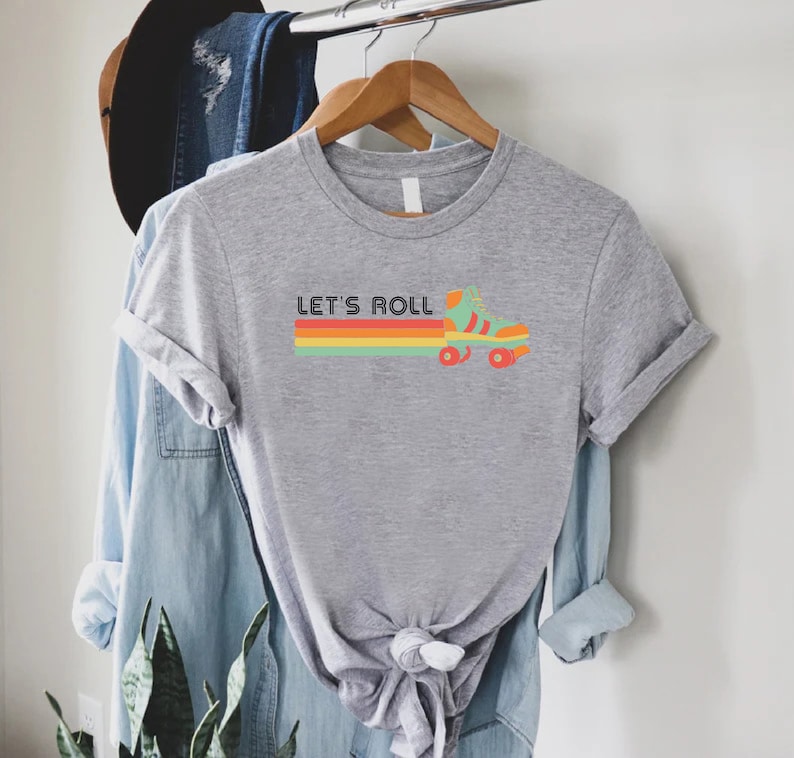 a t - shirt that says let's roll on it