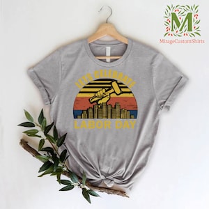 a t - shirt that says, it's glorious labor day