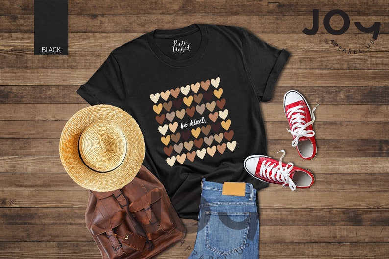 May include: Black t-shirt with a graphic of multicolored hearts and the text "be kind."
