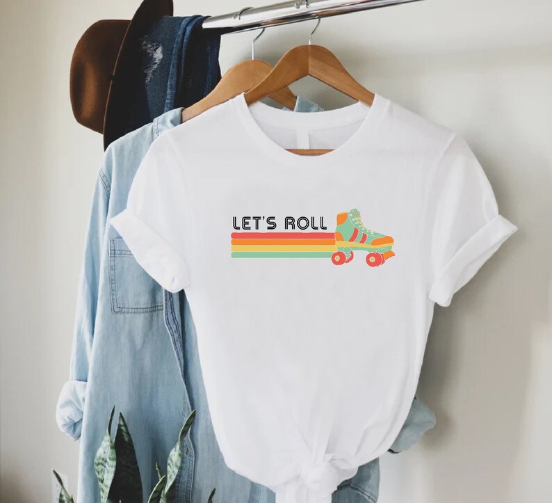 a t - shirt that says let's roll on it