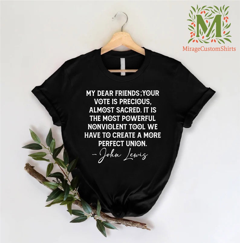 a black t - shirt with a quote on it