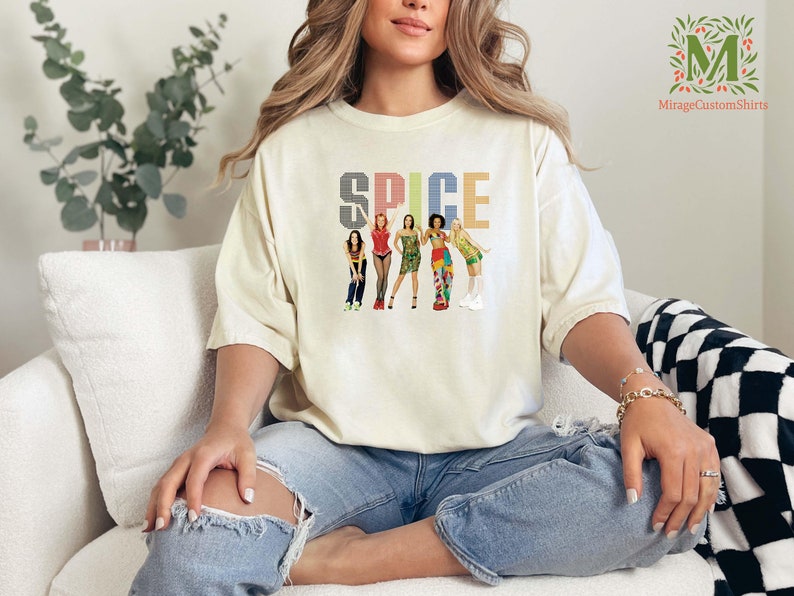 a woman sitting on top of a white couch