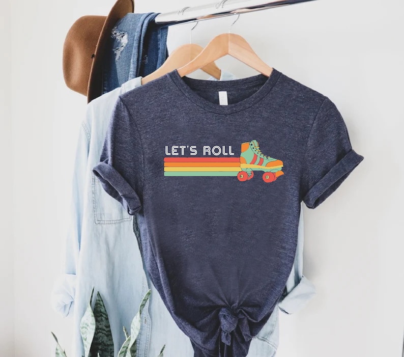 a t - shirt that says let's roll on it