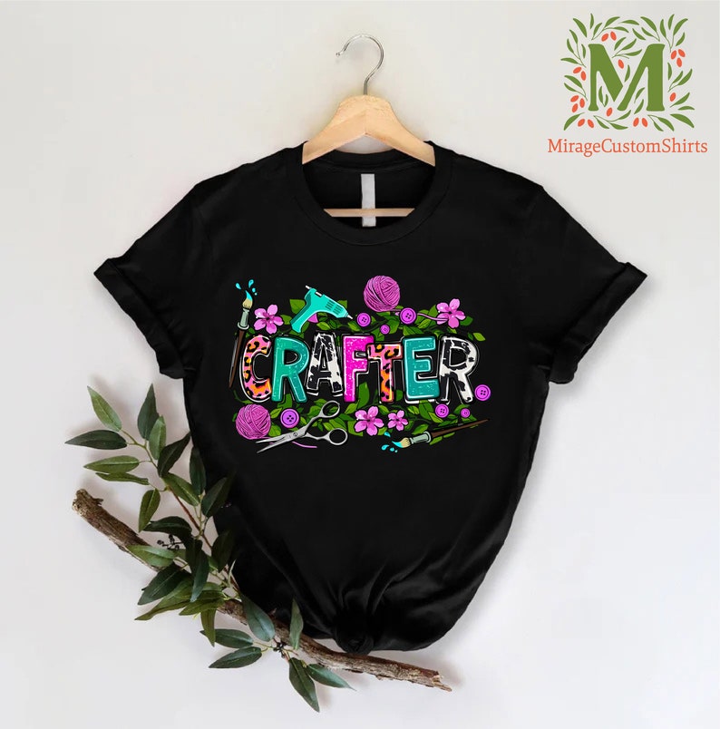 a black shirt that says rafter with flowers on it