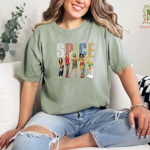 a woman sitting on a couch with her legs crossed