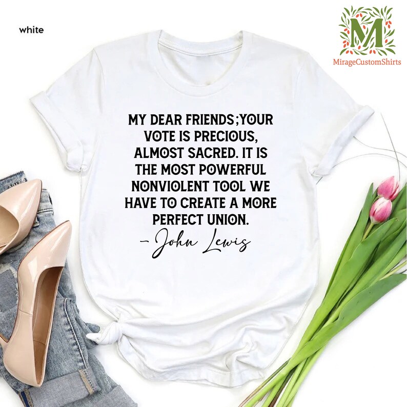 a white t - shirt with a quote on it