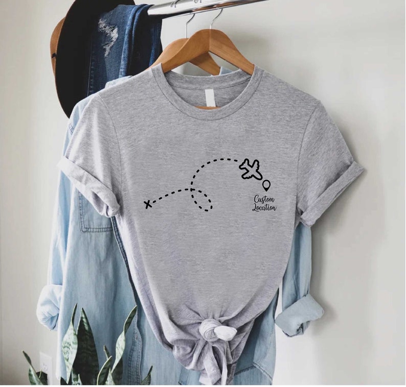 a t - shirt hanging on a clothes rack