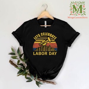 a black shirt that says let's celebrate labor day