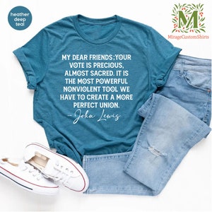 a t - shirt that says, my dear friends your vote is precious