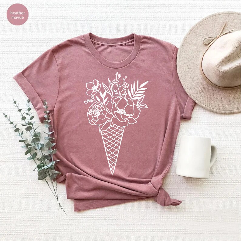 a t - shirt with a flower arrangement on it