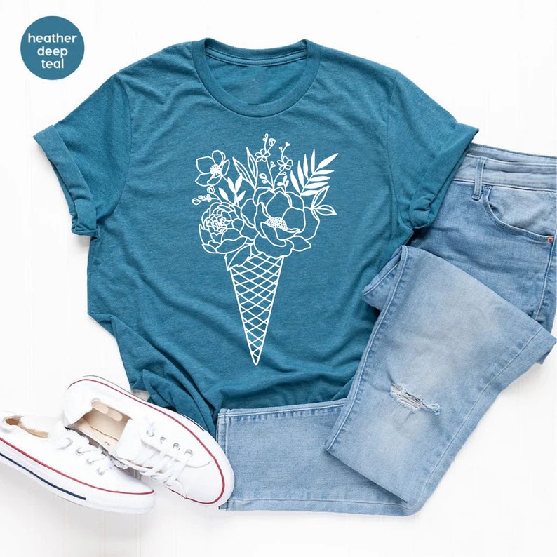 a t - shirt with an ice cream cone with flowers on it