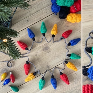 Puede incluir: Una cadena de bombillas de luz de ganchillo en varios colores, incluyendo rojo, amarillo, azul y verde. Las bombillas están conectadas por un cordón gris y están dispuestas en círculo sobre una superficie de madera.