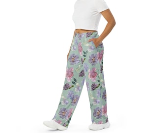 Pantalones anchos con estampado floral verde: corte holgado y bolsillos