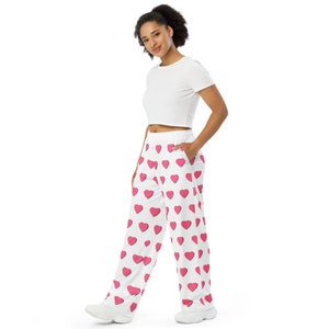 Pink pants with white hearts online