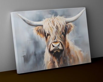 May include: Canvas art print of a Highland cow. The artwork features a close-up of the cow's face, showcasing its long, shaggy, cream-colored fur and large, curved horns. The background is a soft, blurred mix of gray and brown tones.