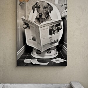 Black and White Dog with Newspaper on toilet Canvas Art
