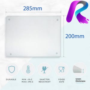 May include: A white tempered glass cutting board with rounded corners. The board measures 285 mm by 200 mm and is 4 mm thick. It is shatter resistant, food safe, and can withstand temperatures from -10 degrees Celsius to 290 degrees Celsius.