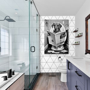 Black and White Dog with Newspaper on toilet Canvas -