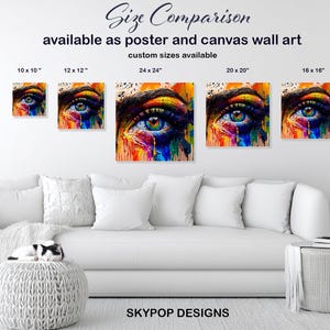 May include: A collection of colorful eye art prints in various sizes, including 10 x 10 inches, 12 x 12 inches, 16 x 16 inches, 20 x 20 inches, and 24 x 24 inches. The artwork is available as poster and canvas wall art. The text "Size Comparison" is at the top.