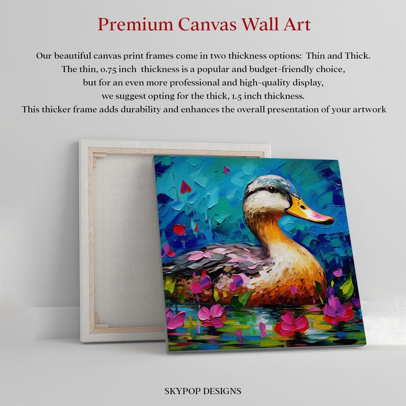 May include: A framed canvas print of a colourful painting of a duck swimming in a pond with pink flowers. The frame is 1.5 inches thick and adds durability to the artwork.  SKYPOP DESIGNS is printed at the bottom of the image.