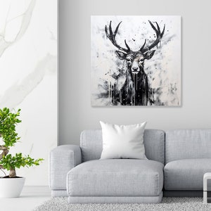 May include: A black and white painting of a deer with large antlers. The deer is facing forward and has a serious expression. The background is a white canvas with black splatters of paint.