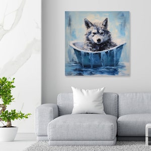 May include: A grey wolf sits in a blue bathtub, with water dripping from the sides. The wolf is looking at the viewer with a serious expression. The background is a light blue and white abstract painting.