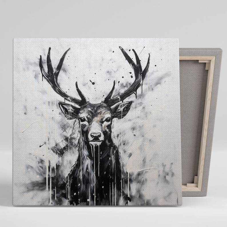 May include: A black and white painting of a deer's head with large antlers. The background is a white canvas with black splatters of paint.