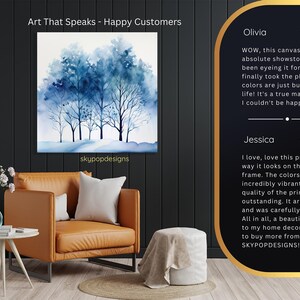 May include: A watercolor painting of blue trees on a white background hangs on a dark wall. The painting is above a brown leather chair with a white pillow. The text "Art That Speaks - Happy Customers" is at the top.