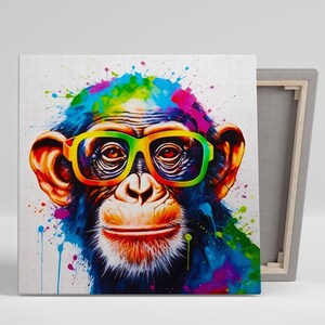 May include: A colorful painting of a monkey wearing bright green and yellow sunglasses. The monkey's fur is painted in shades of blue, green, purple, and pink, with splashes of color around its head.