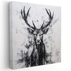 May include: Black and white abstract painting of a deer with large antlers. The deer is facing forward and the background is a splatter of white paint on a gray canvas.