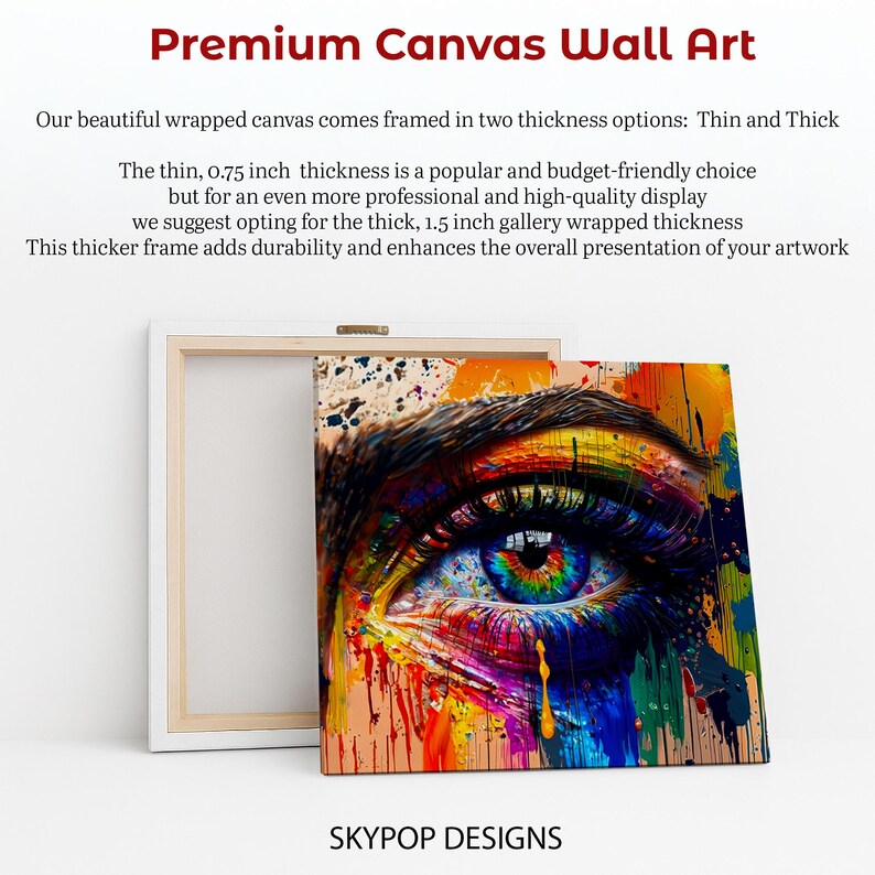 May include: Premium canvas wall art featuring a vibrant, colorful eye with rainbow hues and paint drips. The artwork is available in two thicknesses: 0.75 inch and 1.5 inch. The text "SKYPOP DESIGNS" is at the bottom.