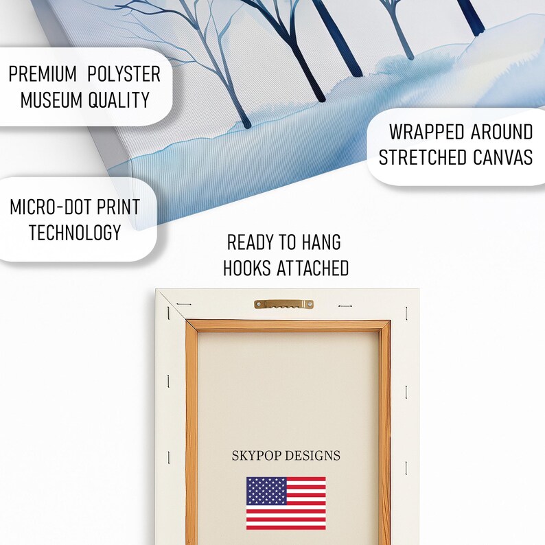 May include: A canvas art print featuring a winter landscape with blue and white watercolor trees. The back of the canvas is visible, showing a wooden frame, hooks, and the text "SKYPOP DESIGNS" with an American flag. The print is wrapped around a stretched canvas.