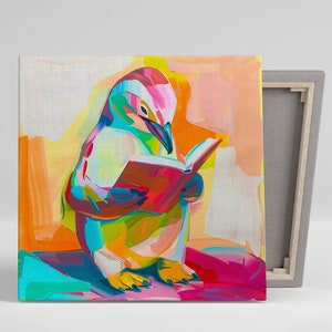 May include: A colourful painting of a penguin reading a book. The penguin is yellow, blue and pink, and the book is red and orange. The background is a mix of orange, yellow and pink.