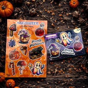 May include: Two Halloween sticker sheets with colorful illustrations of pumpkins, ghosts, and potion bottles. The sheets are on a rustic wooden surface with small pumpkins and leaves scattered around. The text "Halloween Sticker Sheet" and "Happy Halloween" are visible.