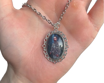 This is the skin of a killer Bella - meme necklace
